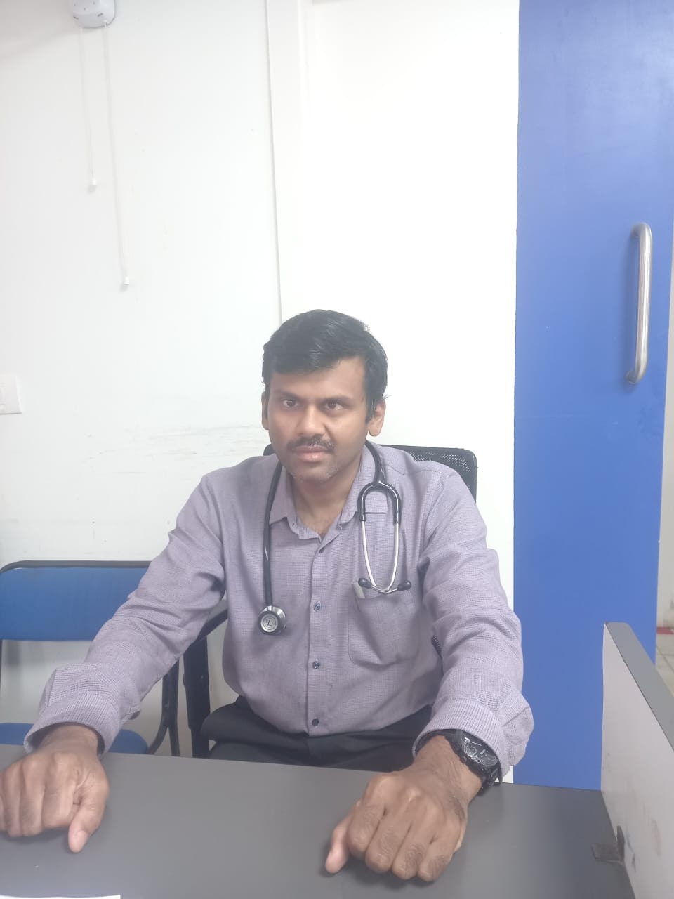 Dr. Naveen G