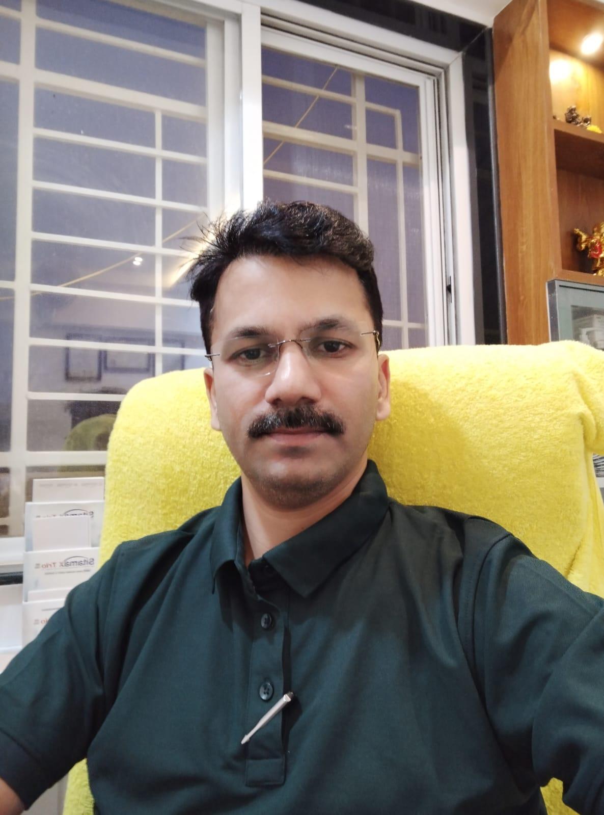 Dr. Atul Kesarkar