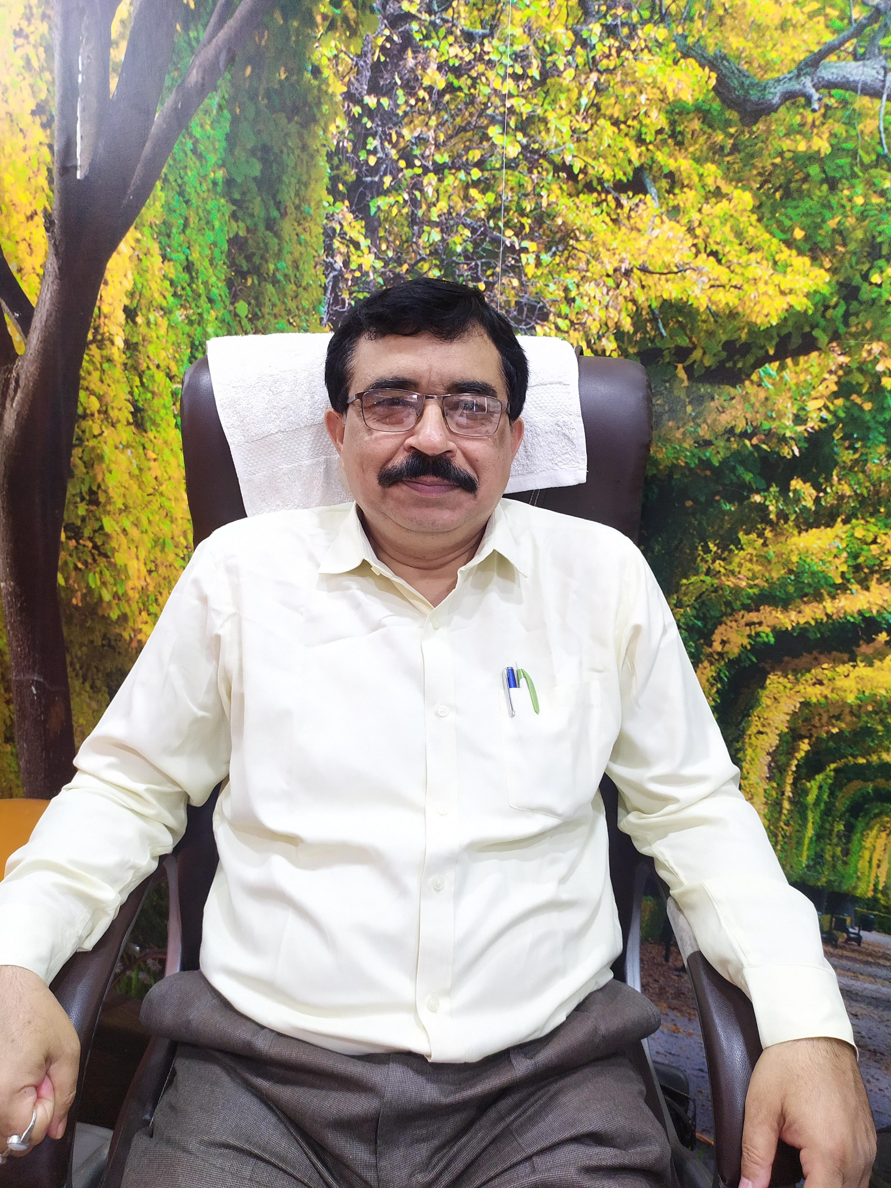 Dr. Neeraj Tandon