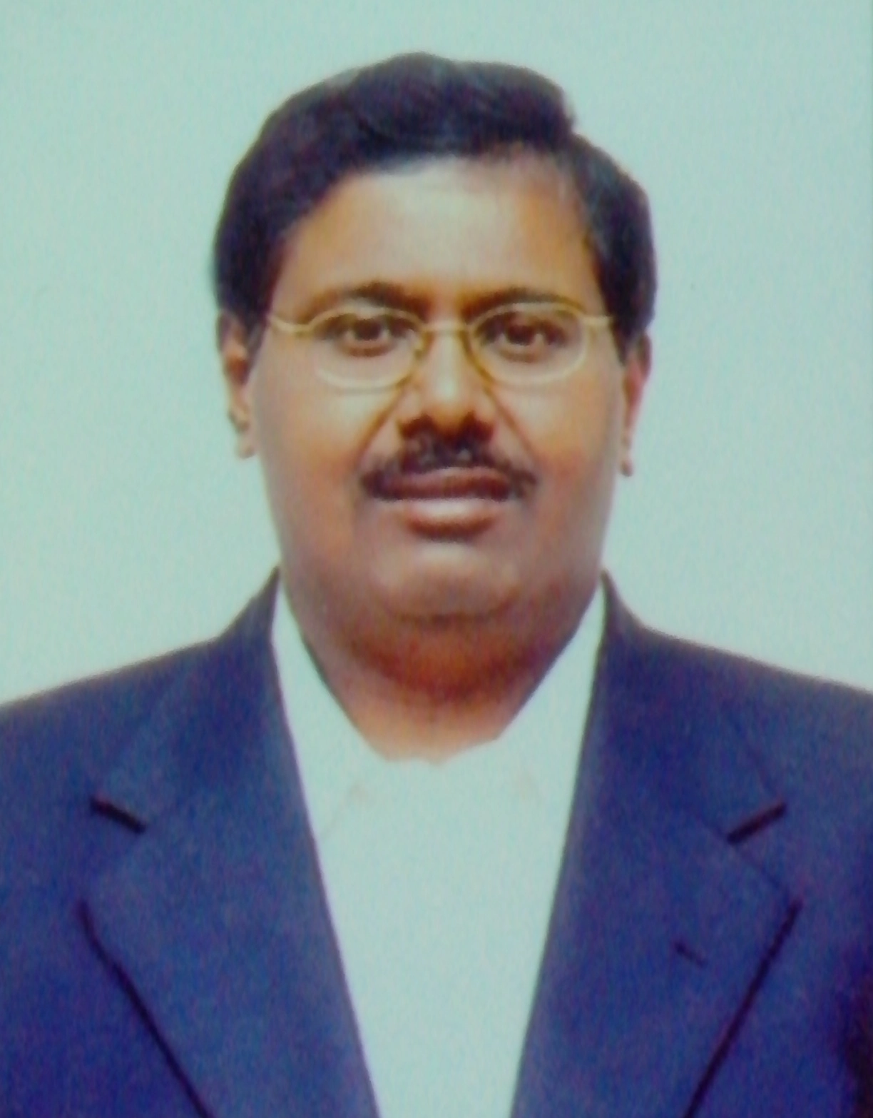 Dr. Raj V George